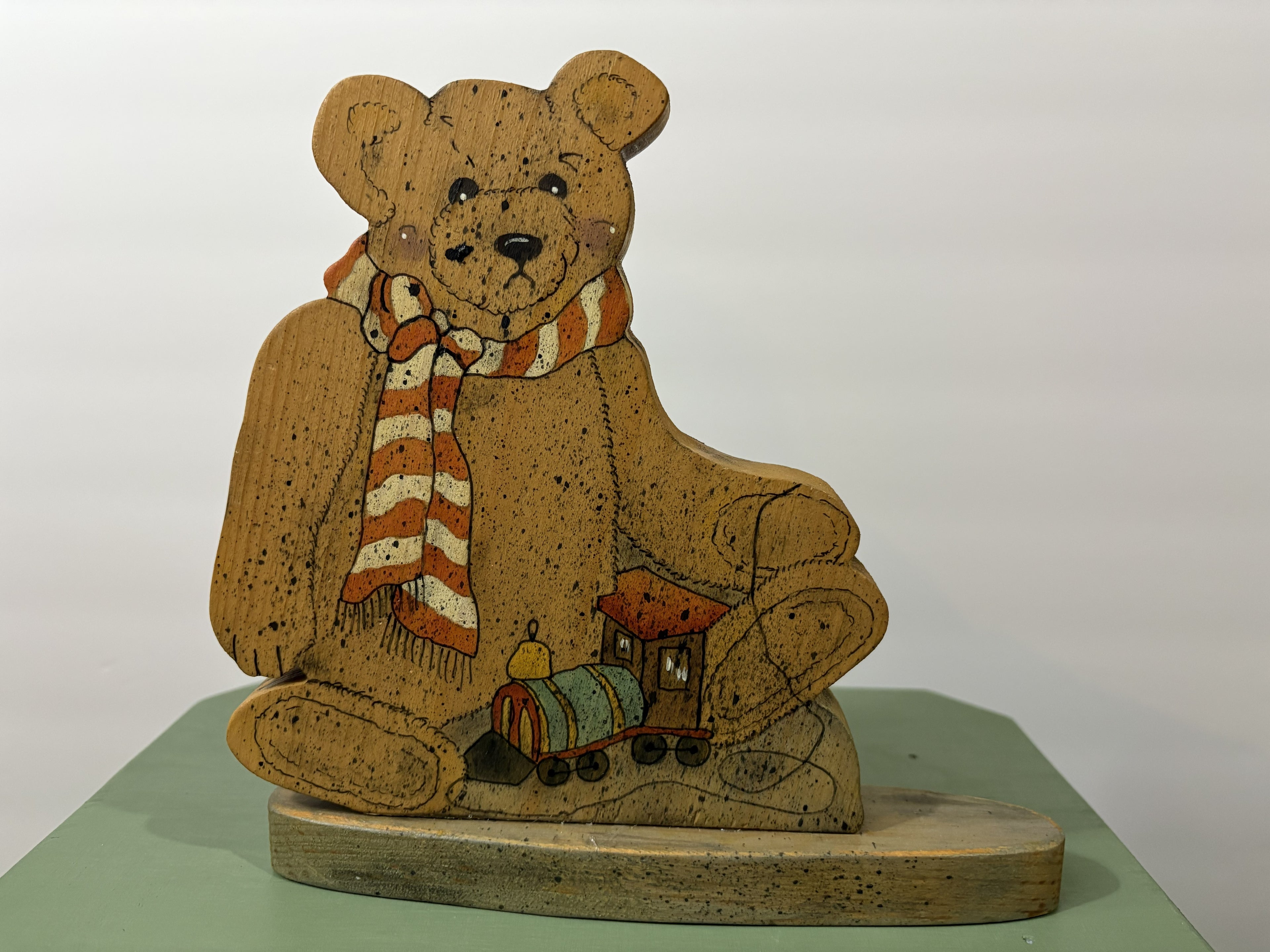 Hand-Painted Wooden Teddy Bear Folk Art Figure — Signed "Eileen Hawk 1995" with Striped Scarf and Toy Train