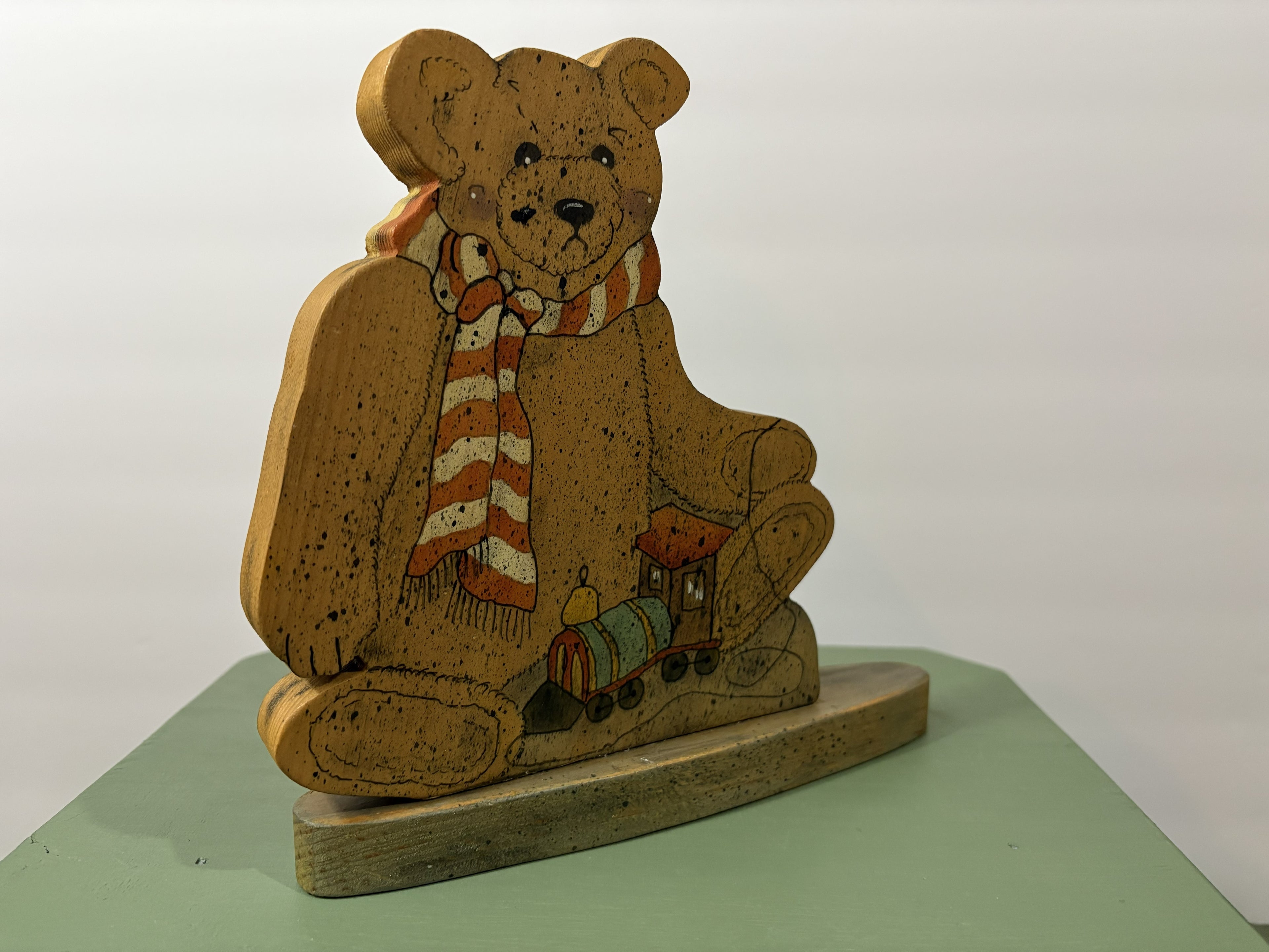 Hand-Painted Wooden Teddy Bear Folk Art Figure — Signed "Eileen Hawk 1995" with Striped Scarf and Toy Train